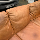 Corner sofa and footstool
