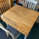 Extending table and chairs