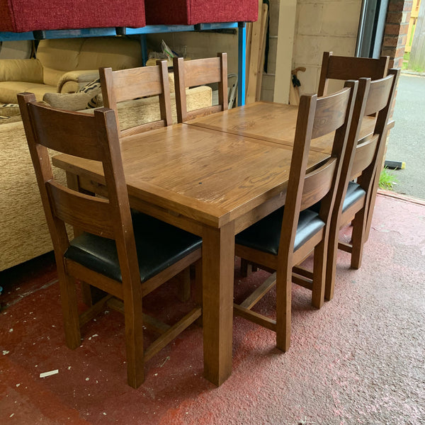 Extending table and chairs