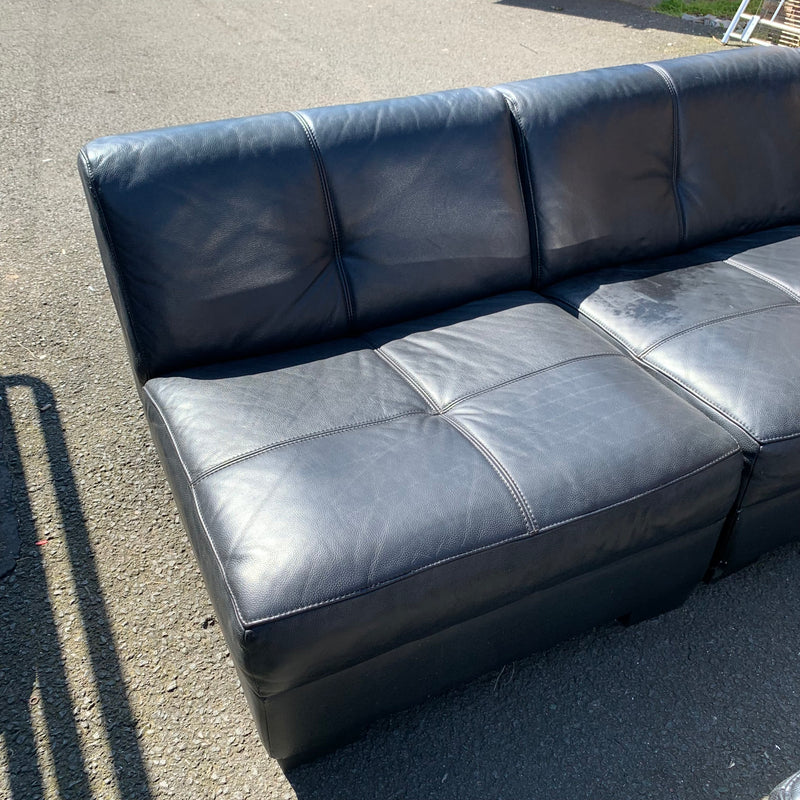Corner sofa and footstool