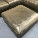 Corner sofa and footstool