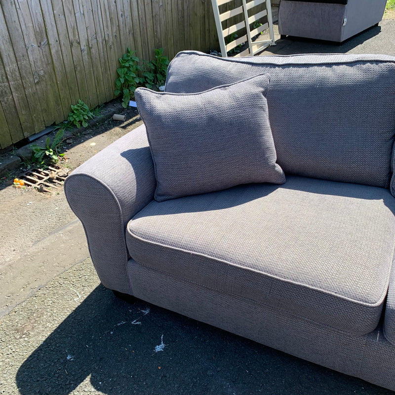 Corner sofa and footstool