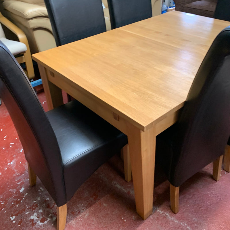 Extending table and chairs