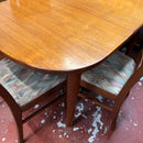 Extending table and chairs