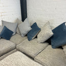 Corner sofa and footstool