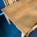 Extending table and chairs