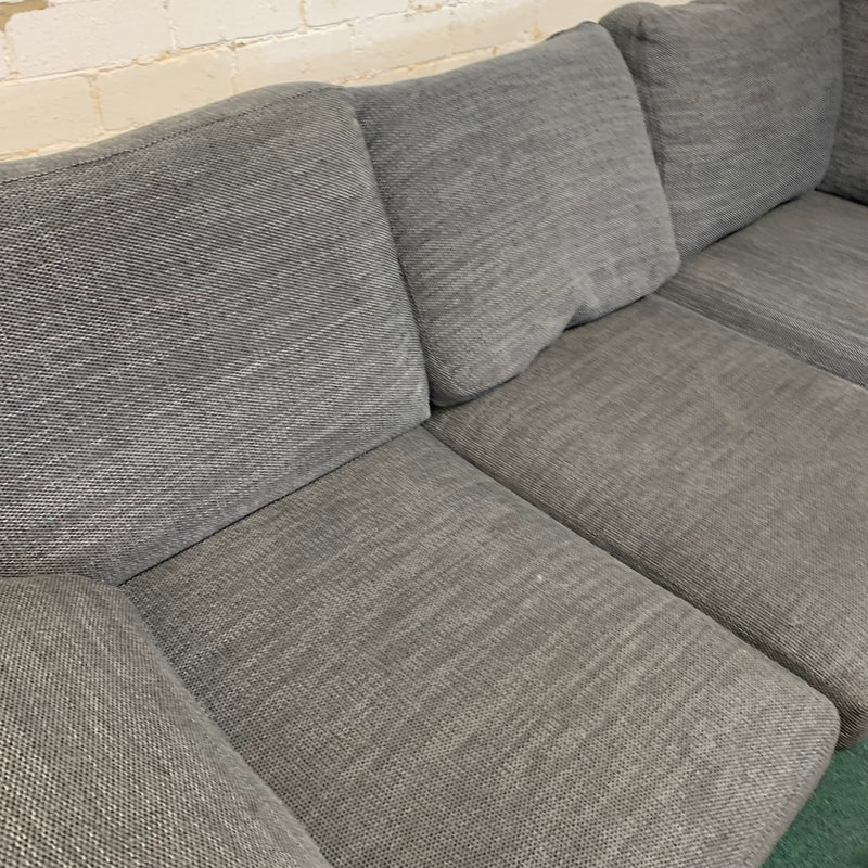 Corner sofa and footstool