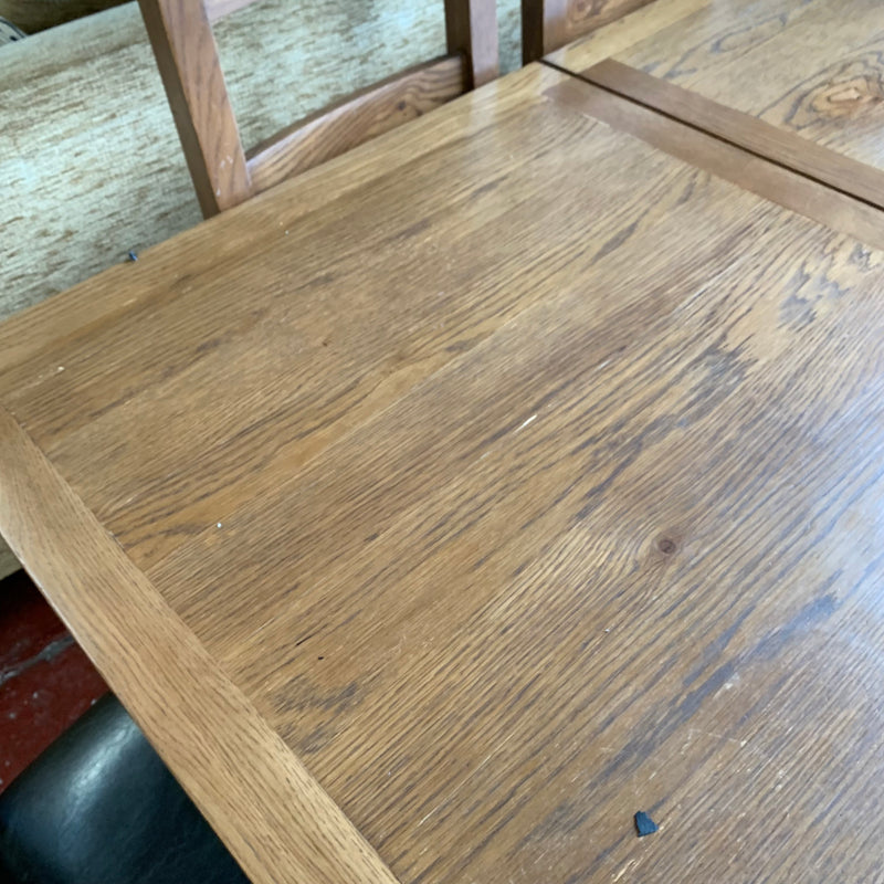 Extending table and chairs