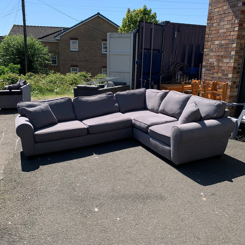Corner sofa and footstool