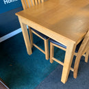 Extending table and chairs