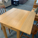 Extending table and chairs