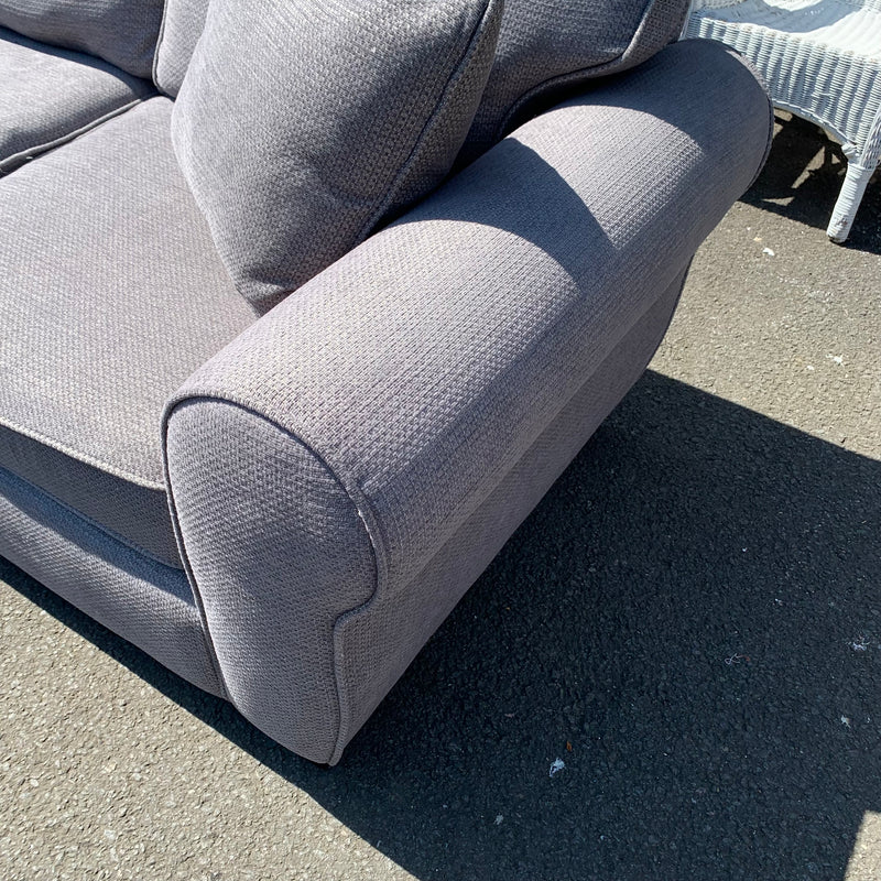 Corner sofa and footstool