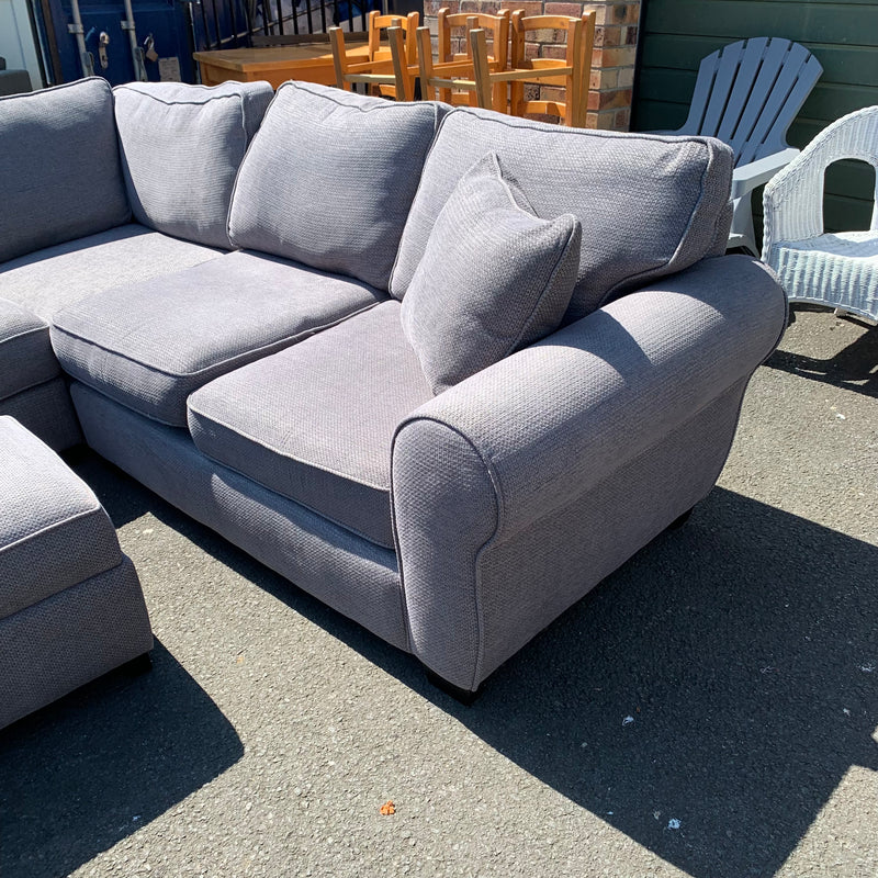 Corner sofa and footstool