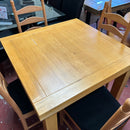 Extending table and chairs