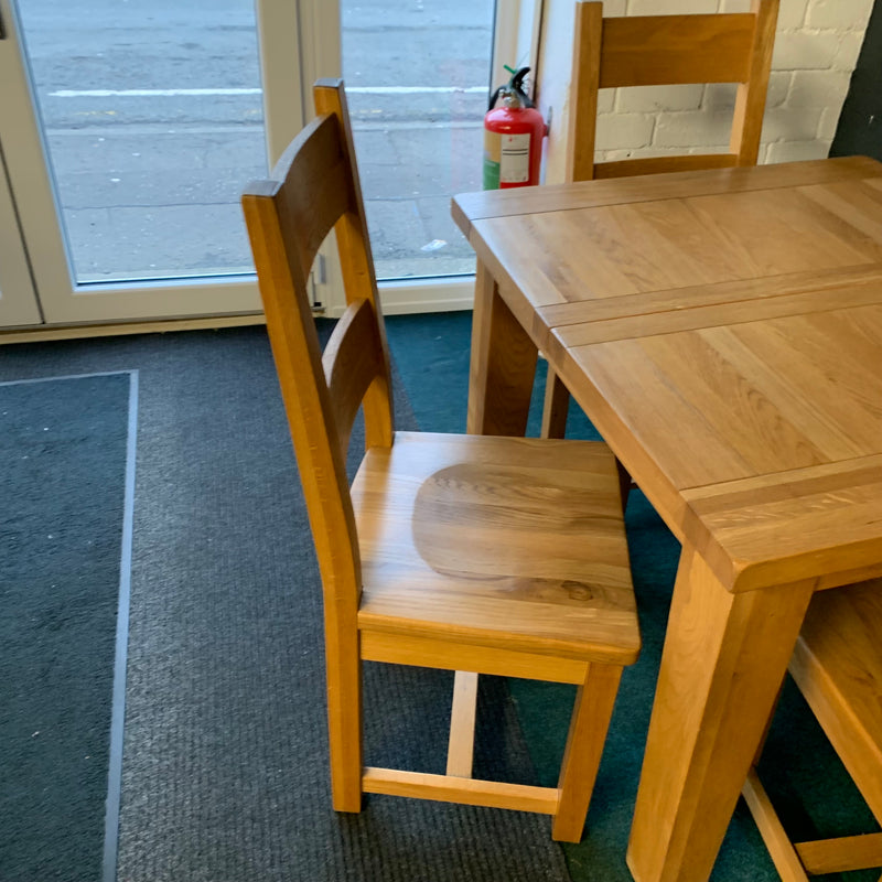 Extending table and chairs