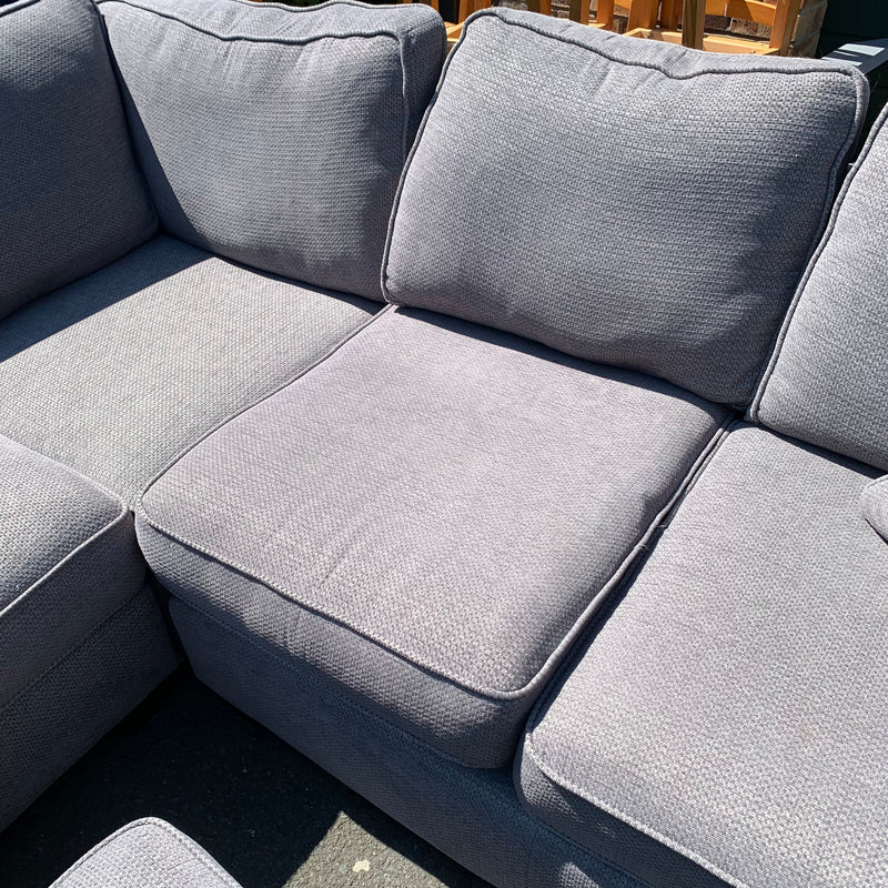 Corner sofa and footstool