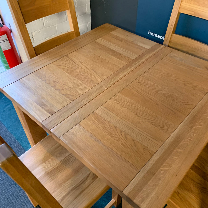 Extending table and chairs