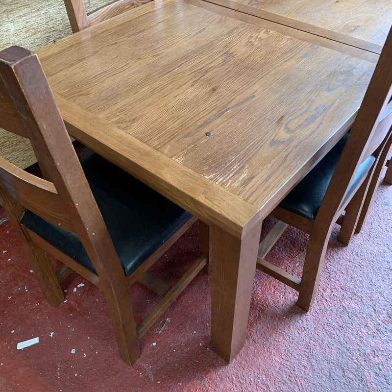 Extending table and chairs