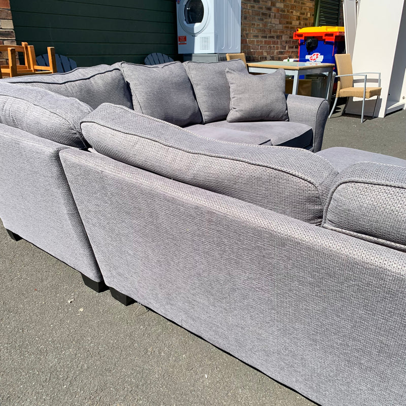 Corner sofa and footstool