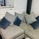 Corner sofa and footstool
