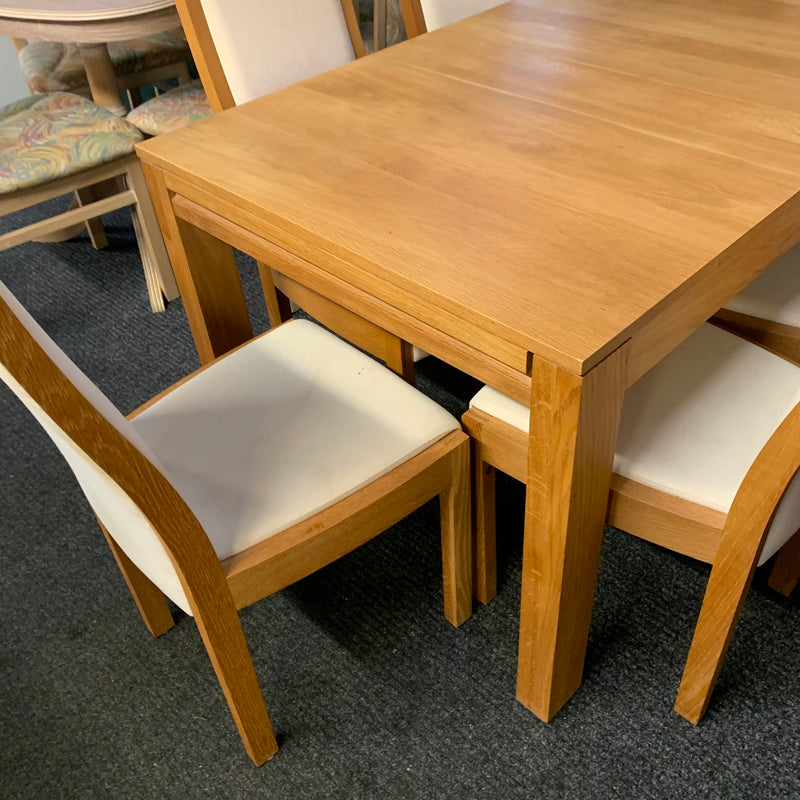 Extending table and chairs