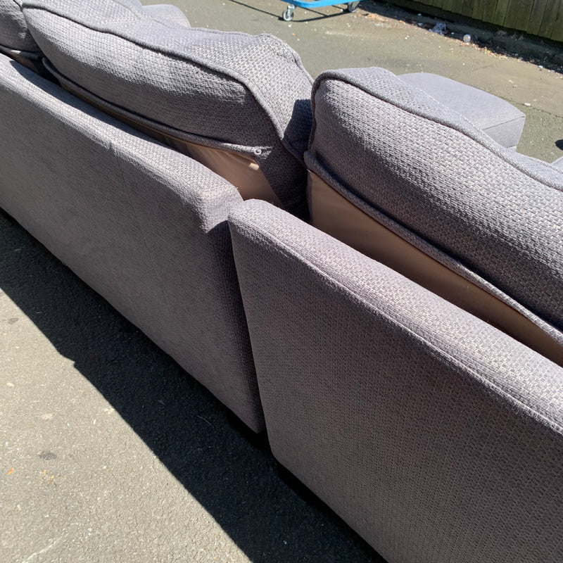 Corner sofa and footstool