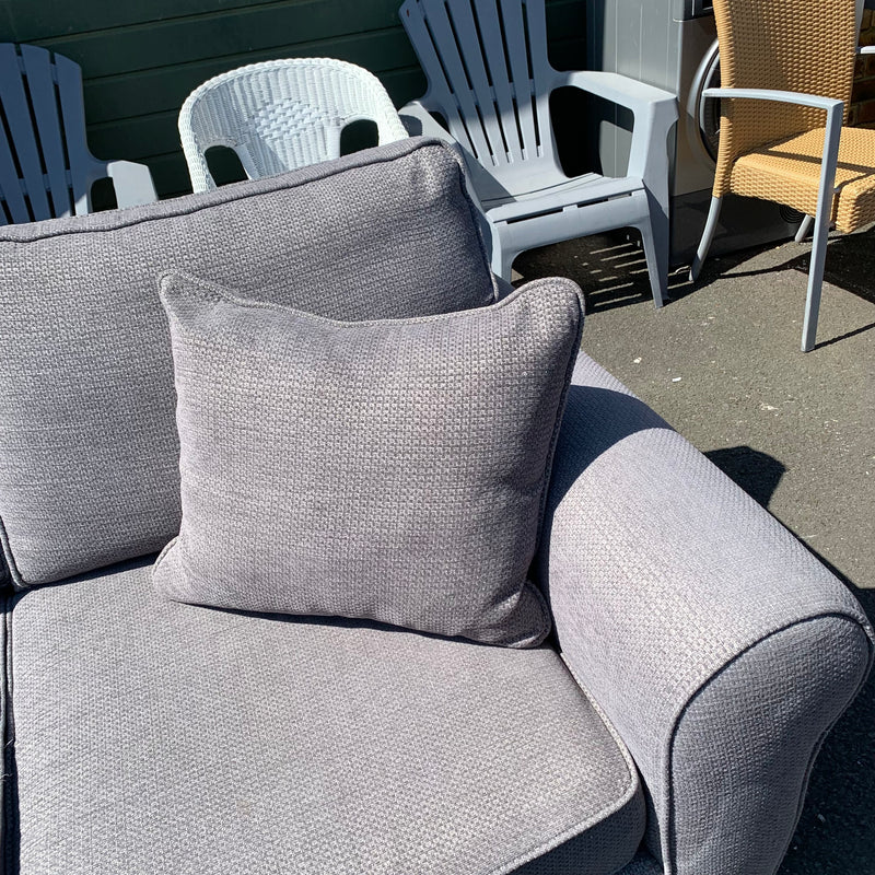 Corner sofa and footstool